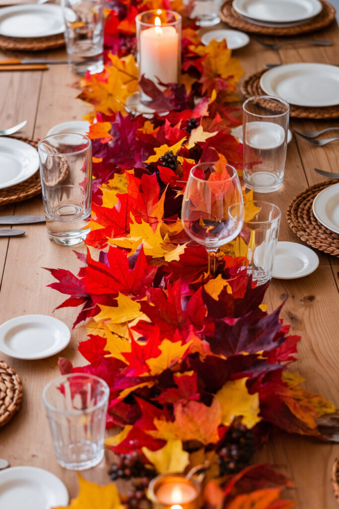 Simple Thanksgiving table setting using a crisp tablecloth and fall-inspired centerpiece.

